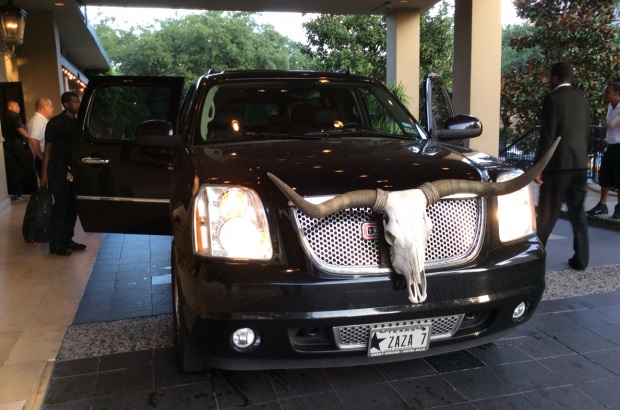 SUV with skull attached to front grille