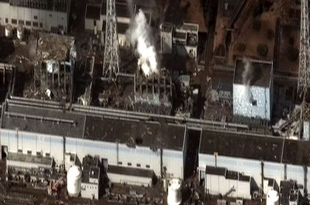 An aerial photograph of the damaged reactor buildings at the Fukushima Daiichi Nuclear Power Plant, taken on 16 March 2011