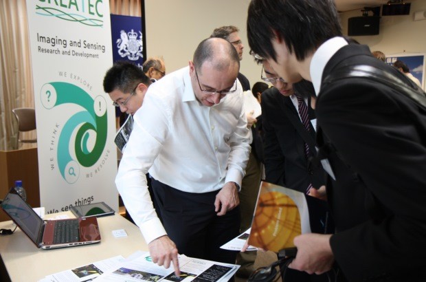 Pete Woolaghan, Director of Createc, explaining to Japanese delegates about his company's sensor technology at the British Embassy’s robotics week