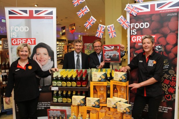 Staff at Kaiser's supermarket 'welcome the Queen' with a selection of Great British food 